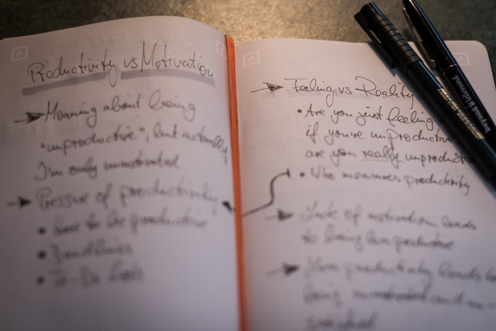 A notebook with my thoughts on productivity vs motivation